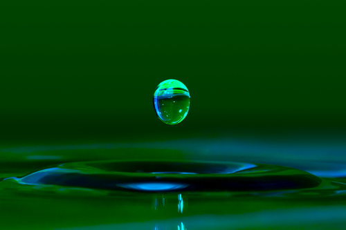Photo of droplet about to hit water